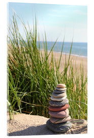 Acrylic print A tower of stones on a dune at the sea - Buellom