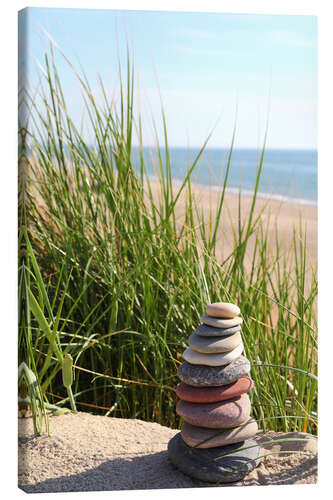 Leinwandbild Ein Steinturm auf der Düne am Meer