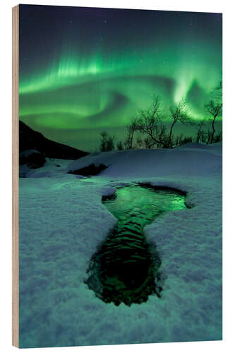 Wood print Aurora Borealis over a frozen river