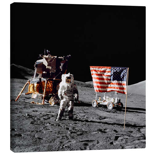 Canvas print Apollo 17 astronaut stands near the United States flag