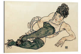 Magnettafel Liegende Frau mit grünen Strümpfen