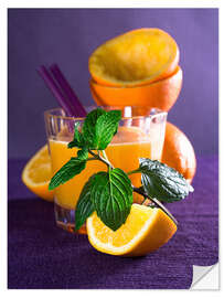 Naklejka na ścianę Orange juice in a glass