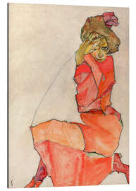 Magnettafel Kniendes Mädchen in orange-rotem Kleid