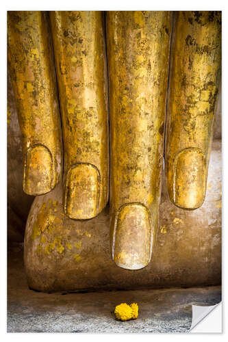 Naklejka na ścianę Golden fingers of a Buddha statue