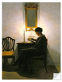 Naklejka na ścianę Woman reading by candlelight