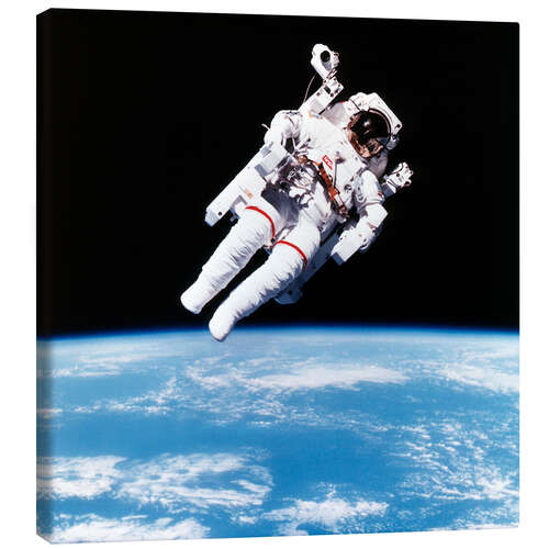 Leinwandbild Astronaut Bruce McCandless mit Propeller Rucksack