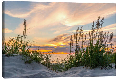 Leinwandbild Ostseestrand im Sonnenunterang