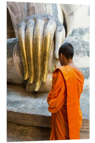 Foam board print Monk praying in front of Buddha Hand