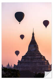 Naklejka na ścianę Temple at sunrise with balloons flying, Bagan, Myanmar