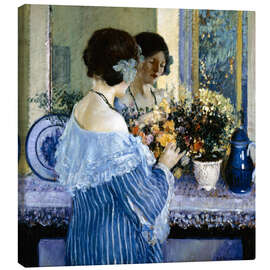 Lienzo Girl in Blue Arranging Flowers - Frederick Carl Frieseke