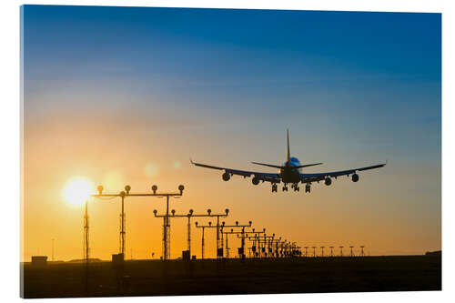 Akrylbillede Aeroplane landing at sunset