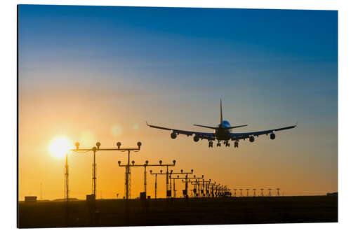 Aluminium print Aeroplane landing at sunset