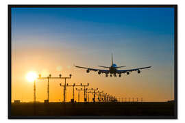 Gerahmter Kunstdruck Flugzeug bei Sonnenuntergang