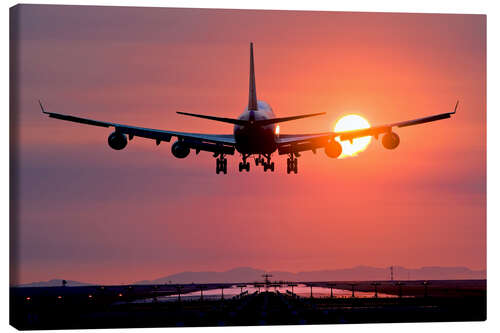 Leinwandbild Flugzeug im Abendrot