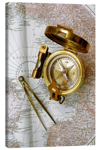 Canvas print Compass and dividers on a map