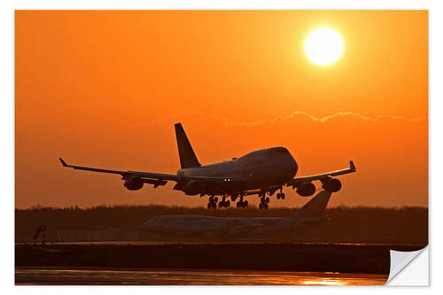 Vinilo para la pared Aterrizando un Beoing B747-400 en la puesta de sol