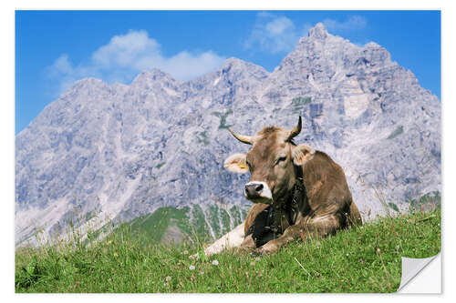 Wall sticker Cow on a mountain meadow