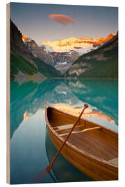 Wood print Canoe on Lake Louise at sunrise