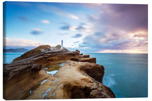 Canvas print Lighthouse and sea at sunrise on the coast of New Zealand