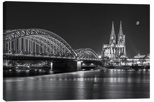 Canvas print Cologne Cathedral and Hohenzollern Bridge at night (b / w)