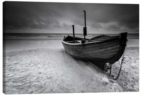 Obraz na płótnie Fishing boat on the beach monochrome