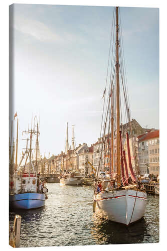 Quadro em tela Old sailing boat in evening light in Nyhavn in Copenhagen. Denmark