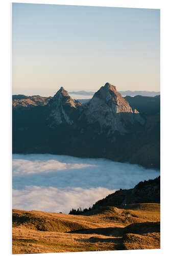 Print på skumplade Grosser and Kleiner Mythen mountain peak above cloudscape at sunrise