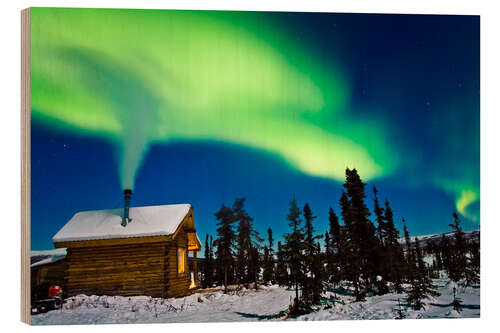 Puutaulu Northern Lights over a hut