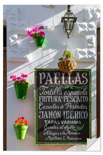 Muursticker Typical whitewashed ornate wall and paella sign, Andalusia Spain