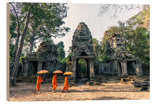 Wood print Monks with umbrellas inside Angkor Wat temples, Cambodia