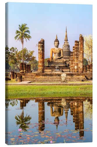 Canvas print Wat Mahathat buddhist temple reflected in pond, Sukhothai, Thailand