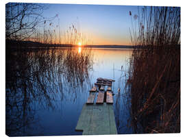 Canvas print Landscape: wooden jetty at sunset on lake Varese, Italy