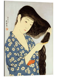 Magnettafel Junge Frau beim Kämmen ihrer Haare