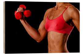 Wood print Sportswoman With Red Dumbbells