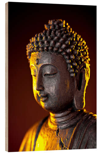 Wood print Buddha in the evening light