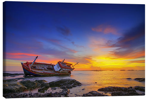 Canvas-taulu Shipwreck in the sunset