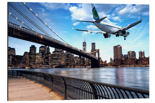 Tableau en aluminium Un avion survolant New York