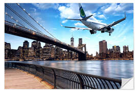 Sticker mural Un avion survolant New York
