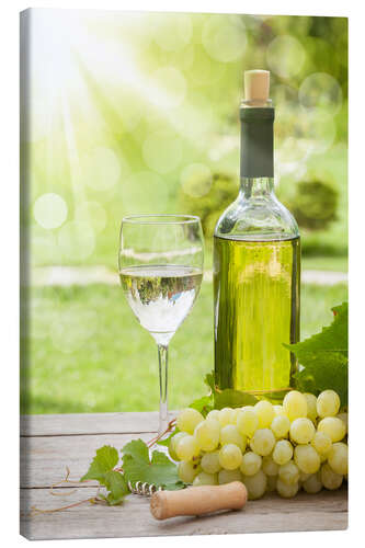 Canvas print White wine glass and bottle