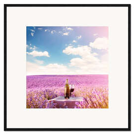 Ingelijste kunstdruk Red wine bottle and wine glass in lavender field