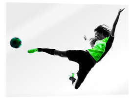 Obraz na szkle akrylowym Female Footballer jumping