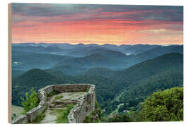 Wood print Sunrise at a castle ruin in Palatinate Forest