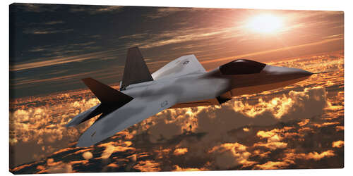 Canvas print An F-22 fighter jet flies at an altitude above the cloud layer on its mission.