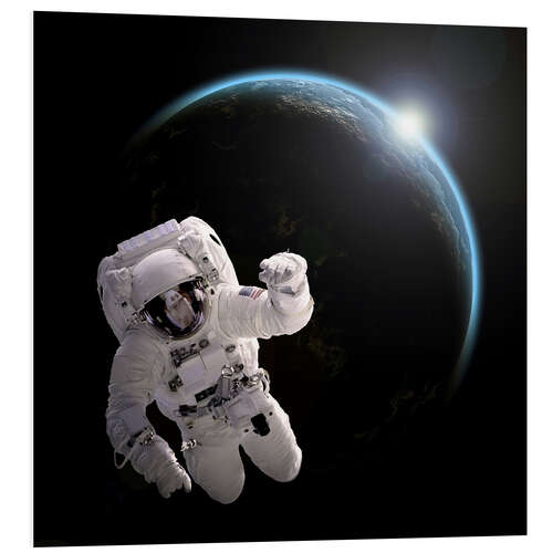 PVC-taulu Astronaut floating in space as the sun rises on to Earth-like planet.