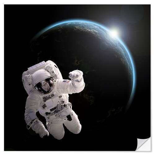 Wall sticker Astronaut floating in space as the sun rises on to Earth-like planet.