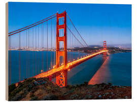 Cuadro de madera Night shot of the Golden Gate Bridge in San Francisco California, USA