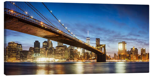 Canvas print Panoramic of Brooklyn bridge and Manhattan skyline at night, New York city, USA