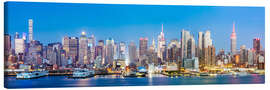 Canvas print Manhattan skyline panoramic at night, New York city, USA