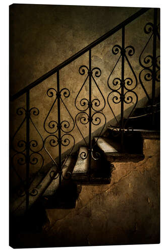 Canvas print Old staircase with ornamented handrail