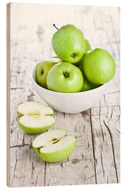 Wood print Green apples in a bowl